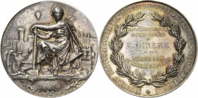 Slg. Joos - Medaillen, Plaketten, Abzeichen der Luftfahrt 1783-1945
 Versilberte Bronzemedaille o.J. (graviert 1910) (unsigniert) Auf Amboss sitzende...