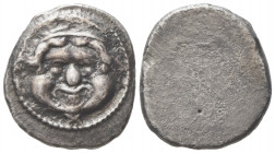 Etruria, Populonia, Didrachm of 10 units, ca. 425-400 BC; AR (g 7,46; mm 21); Head of Metus facing, hair bound with diadem; below, X, Rv. Blank. EC I,...