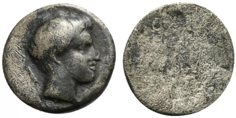 Etruria, Populonia, As, 3rd century BC; AR (g 0,39; mm 7); Male head r.; behind,...
