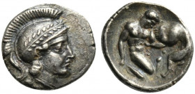 Apulia, Tarentum, Diobol, ca. 380-325 BC; AR (g 1,16; mm 11; h 11); Head of Athena r., wearing Attic helmet decorated with olive-wreath, Rv. Heakles k...