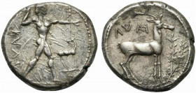 Bruttium, Caulonia, Stater, ca. 475-425 BC; AR (g 7,93; mm 20; h 5); Apollo advancing r., holding branch; small daimon running on his arm; on r., stag...