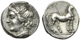 Bruttium, Lokris (?), Quarter Shekel struck during the Second Punic War, ca. 215-205 BC; AR (g 1,99; mm 13; h 3); Wreathed head of Tanit l., Rv. Horse...
