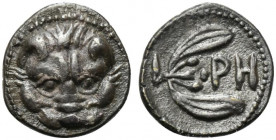 Bruttium, Rhegion, Litra, ca. 415-387 BC; AR (g 0,77; mm 9; h 4); Facing lion's head, Rv. PH between two leaves of olive-sprig. HNItaly 2499.
Dark pat...