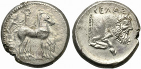 Sicily, Gela, Tetradrachm, ca. 465-450 BC; AR (g 17,18; mm 25; h 2); Charioteet, holding kentron and reins, driving slow biga r.; in background, Ionic...