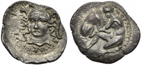 Sicily, Morgantina, Litra, ca. 339-317 BC; AR (g 1,12; mm 15; h 11); Bust of Athena in Attic helmet facing three-quarter l.; below, Artist signature E...