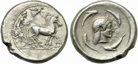 Sicily, Syracuse, Tetradrachm struck under Hieron I, ca. 480-475 BC; AR (g 16,87; mm 26; h 12); Charioteer, holding kentron and reins, driving slow qu...