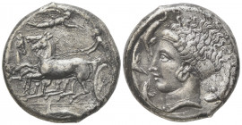 Sicily, Syracuse, Unsigned Tetradrachm in the style of Eukleidas struck under Dionysios I, ca. 405-400 BC; AR (g 17,24; mm 24; h 7); Charioteer, holdi...