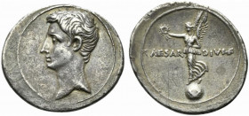 C. Caesar Octavianus, Denarius, Brundisium or Rome, ca. 32-29 BC; AR (g 3,51; mm 22; h 11); Bare head l., Rv. Victory standing l. on globe, holding wr...