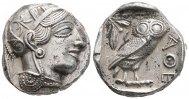 Greek
ATTICA, Athens (Circa 449-404 BC.)
AR Tetradrachm (23.9mm, 17g)
Head of Athena to right, wearing crested Attic helmet adorned with three olive l...
