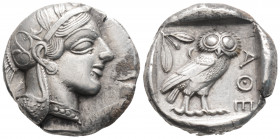 Greek 
ATTICA, Athens (Circa 449-404 BC)
AR Tetradrachm (25.6mm, 17.1g)
Head of Athena to right, wearing crested Attic helmet adorned with three olive...