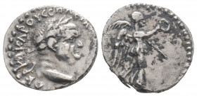 Roman Provincial
CAPPADOCIA, Caesarea, Vespasian (69-79 AD)
AR Hemidrachm (14.6m, 1.8g)
Obv: Laureate head right.
Rev: Nike advancing right, holding w...
