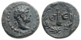 Roman Provincial
CAPPADOCIA, Caesarea, Hadrian. (119/120 AD) 
AE Bronze (13mm, 2g)
Obv: Laureate head to right
Rev: Club within wreath; ЄT-Є (date) ac...