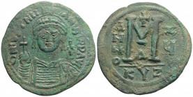 Byzantine
Justinian I (527-565 AD) Constantinople
AE Follis (41.7mm, 23.1g)
Obv: Helmeted and cuirassed bust facing, holding globus cruciger and shiel...