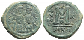 Byzantine
Justin II, with Sophia (565-578 AD) Nicomedia
AE Follis (29.8mm, 12.4g)
Obv: D N IVSTINVS P P AVG Justin II, holding globus cruciger in his ...