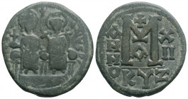 Byzantine
Justin II (565-578). Kyzikos.
AE Follis (28mm 13.1g) 
Obv: D N IVSTINVS P P A.
Justin, holding globus cruciger, and Sophia, holding crucifor...