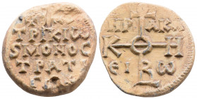 Byzantine Lead Seal ( 9th century)
Obv: Cruciform monogram
Rev: 3 (three) lines of text.
(16.4 g, 26.2 mm diameter)