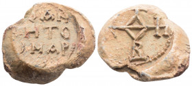 Byzantine Lead Seal ( 9th century)
Obv: Cruciform monogram
Rev: 3 (three) lines of text.
(15.6 g, 27.2 mm diameter)