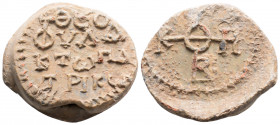 Byzantine Lead Seal ( 6th century)
Obv: Cruciform monogram
Rev: 4 (four) lines of text.
(15.8 g, 26.3 mm diameter)