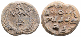 Byzantine Lead Seal (7th-8th centuries)
Obv: Eagle standing facing, head and tail right, wings spread; monogram above
Rev: 4 (four ) lines of text
(10...