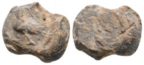 Byzantine lead seal. (6th-7th centuries).
Obv: Eagle standing left
Rev : Blank
(3,44 g 15.4 mm diameter)