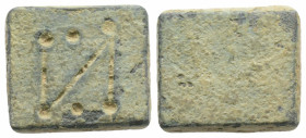 Byzantine Weight (5th-7th centuries)
Weight of 1 Nomisma (14.1mm., 4,43g.)
Obv: Square coin weight, engraved N, one pellet to right, one pellet below ...