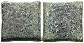 Byzantine Commercial Weight (4th-6th centuries)
Obv: A square coin weight with plain edges. Large Chi-Rho and E. 
Rev: Blank. 
(Orichalcum, 35.68 g 28...