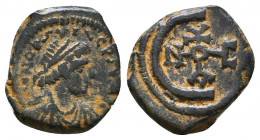 Justin II. 565-578. AE Pentanummi Reference: Condition: Very Fine

 Weight: 2,1 gr Diameter: 16 mm