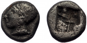 Ionia, Phokaia, AR diobol (Silver, 9,3 mm, 1,22 g), ca. 510-494 BC.
Obv: Female head left, wearing kappe (or saccos?). 
Rev: Quadripartite incuse squa...