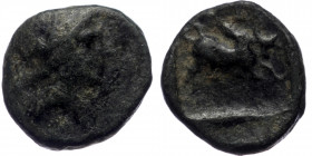 Phrygia Kibyra AE (Bronze, 12mm, 1.58g) Late 2nd-1st century BC. 
Obv: Male head to right, wearing crested helmet. 
Rev. [KIBYPATΩN], Humped bull butt...