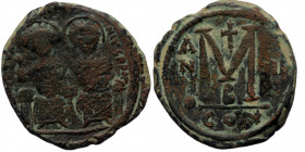 Justin II and Sophia (565-578 ) AE Follis (Bronze, 14.51g, 29mm) Constantinople 
Obv: D N IVSTINVS PP AVG, legend with Justin left holding globus cruc...