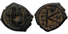Justin II with SOPHIA 5(65-578) AE Half Follis (Bronze, 5.44g, 21mm) Thessalonica, Dated Year 5 (569/70). 
Obv: Nimbate Justin II, holding globus cruc...