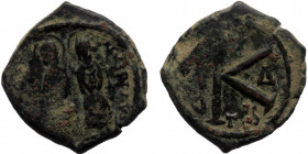 Justin II with Sophia (565-578) AE Half Follis (Bronze, 6.20g. 20mm) Thessalonica 
Obv: Justin on left and Sophia on right, seated facing on double th...