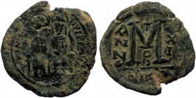 Justin II with Sophia (565-578) Æ Follis (Bronze, 30mm, 13.20g) Nicomedia, Dated RY 11 (575/6). 
Obv: Justin and Sophia seated facing on double throne...
