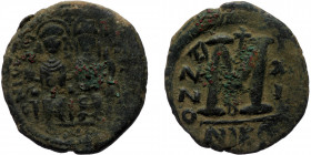 Justin II with Sophia (565-578) Æ Follis (Bronze, 28mm, 12.58g) Nicomedia, Dated RY 11 (575/6). 
Obv: Justin and Sophia seated facing on double throne...