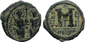Justin II, with Sophia (565-578) AE follis (Bronze, 30mm, 13.58g) Theoupolis (Antioch) mint Dated RY 7 (571/572). 
Obv: Justin and Sophia seated facin...