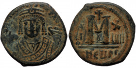 Maurice Tiberius (582-602) AE follis (Bronze, 26mm, 10.48g). Antioch/Theupolis, 596-597. 
Obv: D N mAЧΓI - CN P AЧT, crowned (trefoil ornament on crow...