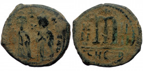 Phocas (602-610) AE Follis (Bronze, 10.28g, 29mm) Antiochia year 4 (605-606) 
Obv: ON FOCA NEP EAV, Phocas and Leontia standing facing, the Emperor ho...