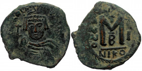 Heraclius AE follis (Bronze, 9.64g, 29mm) Nicomedia 
Obv: Helmeted, draped, cuirassed bust facing, holding cross 
Rev: Large M, ANNO to left, cross ab...