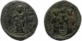 Constantine X Ducas (1059-1067) with Eudocia AE Follis (Bronze, 31mm, 8.85g) Constantinople.
Obv: + EMMANOVHΛ / IC XC - Nimbate Christ standing facing...