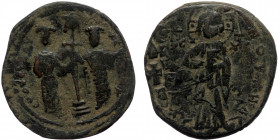 Constantine X Ducas (1059-1067) with Eudocia AE Follis (Bronze, 29mm, 8.87g) Constantinople.
Obv: + EMMANOVHΛ / IC XC - Nimbate Christ standing facing...