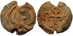 Unreaserched Lead seal (Lead 8.67g, 22mm)
Obv: eagle standing left, head right, with wings spread. Star above
Rev: Four letters cruciform monogram wit...