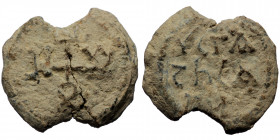 Unreaserched lead seal (Lead, 10.49g, 25mm)
Obv: Four letters cruciform monogram within circular line border
Rev: three lines Greek legend