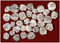 Lote de 33 monedas de 1/2, 1 y 2 reales macuquinos de las cecas de Lima, México y Potosí. Imprescindible examinar. BC-/BC+.
