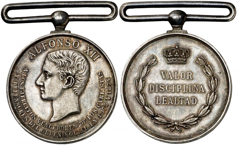 (1873-1874). Alfonso XII. (Pérez Guerra 752). 15 g. 34 mm. Plata. Con pasador si...