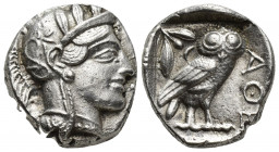 ATTICA. Athens (Circa 454-404 BC). AR Tetradrachm
Obv: Helmeted head of Athena right, with frontal eye.
Rev: AΘE.
Owl standing right, head facing; oli...