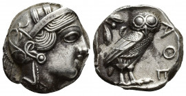 ATTICA. Athens. (Circa 454-404 BC). AR Tetradrachm
Obv: Helmeted head of Athena right, with frontal eye.
Rev: AΘE.
Owl standing right, head facing; ol...