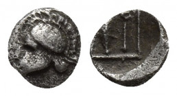 ASIA MINOR. Uncertain. (5th century BC). AR Tetartemorion.
Obv: Corinthian helmet left.
Rev: Amphora and kerykeion; uncertain object (or letter) betwe...