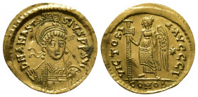 ANASTASIUS I (491-518 AD). AV, Solidus. Constantinople.
Obv: D N ANASTASIVS P P AVG.
Helmeted and cuirassed bust facing slightly right, holding spea...