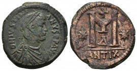 JUSTINIAN I (527-565 AD). AE, Follis. Antioch.
Obv: D N ISTINIYAN P P AV. 
Diademed, draped, and cuirassed bust right.
Rev: Large M; star to left a...