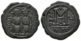 JUSTIN II with SOPHIA (565-578 AD). AE, Follis. Nicomedia. Dated RY 5 (569/70).
Obv: D N IVSTINVS P P AVG. 
Justin, holding globus cruciger, and Sop...